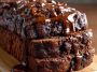 Hot Fudge Brownie Bread with rich chocolate swirls, gooey fudge chunks, and a soft, moist texture served on a plate.
