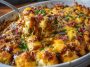 Crazy good casserole with golden melted cheese baked in a dish, served hot.