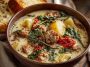 Tuscan sausage and potato soup served in a rustic bowl with creamy broth, tender potatoes, Italian sausage, kale, and herbs, garnished with parmesan and fresh parsley.
