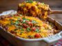 Cheesy crazy good casserole baked golden brown with layers of pasta, meat, and melted cheese served in a dish.