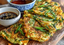 Korean scallion pancakes (pajeon) served with dipping sauce