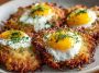 Crispy golden potato latkes topped with perfectly cooked eggs, garnished with fresh herbs.