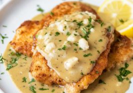 Golden chicken francese cutlets coated in a light egg batter, pan‑fried, and served with lemon butter sauce.