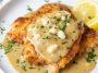 Golden chicken francese cutlets coated in a light egg batter, pan‑fried, and served with lemon butter sauce.