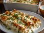 Creamy white chicken enchiladas made with shredded rotisserie chicken, tortillas, and cheese, baked until golden and bubbly.
