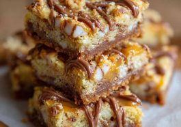 Golden cake mix toffee bars with chocolate drizzle and crunchy toffee pieces on a serving tray