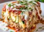 Cheesy zucchini pizza casserole baked with layers of zucchini, tomato sauce, melted cheese, and toppings.
