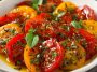 Marinated tomatoes with herbs, garlic, and olive oil in a fresh, flavorful dressing.