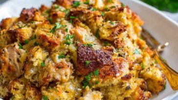 Baked chicken and stuffing casserole with a creamy texture and golden top.