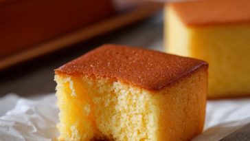 Bitten slice of Castella cake showing fluffy texture
