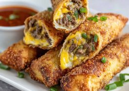 Crispy egg rolls filled with Philly cheesesteak steak, melted cheese, and sautéed peppers and onions.
