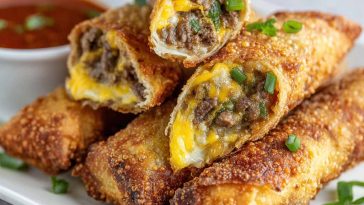 Crispy egg rolls filled with Philly cheesesteak steak, melted cheese, and sautéed peppers and onions.