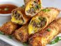 Crispy egg rolls filled with Philly cheesesteak steak, melted cheese, and sautéed peppers and onions.