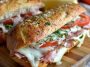 Toasted Italian grinder sandwiches filled with deli meats, melted cheese, and crispy bread.