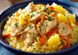 Pineapple chicken and rice cooked in one pan with a sweet and savory glaze.