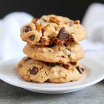 Peanut butter cookies loaded with chocolate chips and crunchy pretzel pieces, baked until golden.