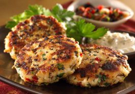 Mediterranean chicken patties with herbs and spices, pan-seared until golden and served with a light sauce.