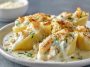 Jumbo pasta shells stuffed with shrimp and crab in a creamy Alfredo sauce, baked until bubbly and golden.