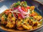 Tender chicken in creamy spicy aji amarillo sauce, a vibrant Peruvian-inspired dish.