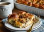 Golden croissant breakfast casserole baked with eggs and cheese, fluffy and rich.