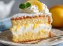 Soft Italian lemon cream cake layered with fluffy lemon sponge and filled with smooth lemon pastry cream, dusted with powdered sugar.