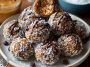 No-bake chocolate peanut butter protein balls made with oats, cocoa, and peanut butter, rolled into bite-sized snacks.
