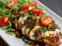 Juicy baked chicken breast glazed with balsamic sauce and topped with melted mozzarella cheese.