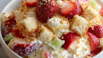 Creamy Hawaiian cheesecake salad with pineapple, mandarin oranges, and fluffy whipped topping.