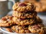 Thick oatmeal cookies with pecans and a pecan pie-style filling, chewy and golden.