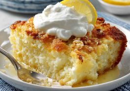 Lemon cream cheese dump cake with a golden buttery topping and creamy layers.