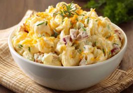 Creamy macaroni salad with cheddar cheese and sour cream dressing.