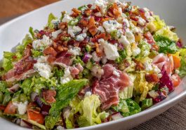 La Scala chopped salad with lettuce, salami, mozzarella, and chickpeas