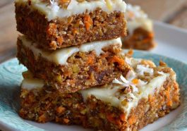 Healthy Easter carrot cake bars topped with light cream cheese frosting and festive sprinkles.