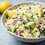 Light cucumber lemon orzo salad with fresh herbs, crisp cucumbers, and a bright citrus dressing.