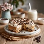 Layered cookie dough cake with soft cake layers, edible cookie dough filling, and creamy frosting.
