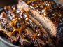 Slow cooker brisket cooked until tender, sliced and served with rich gravy and herbs.