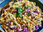 Fresh crunchy corn slaw made with sweet corn, shredded cabbage, colorful peppers, and a creamy tangy dressing.