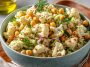Cauliflower and chickpea salad with fresh herbs and a light dressing.