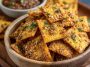Homemade taco crackers seasoned with spices on a tray