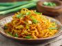 Spicy potato noodles stir-fried with chili sauce and vegetables
