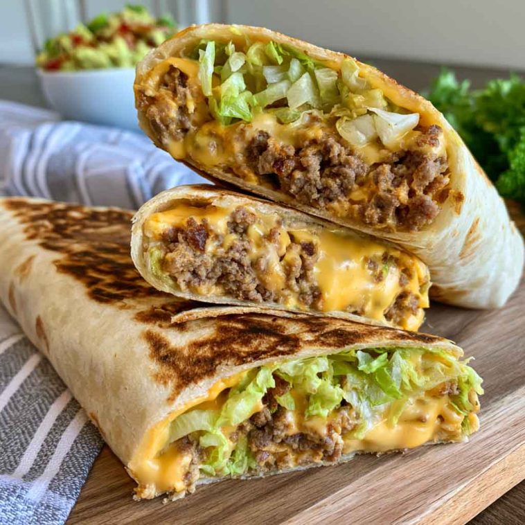 Big Mac wrap filled with beef, lettuce, cheese, pickles, and burger sauce.