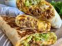 Big Mac wrap filled with beef, lettuce, cheese, pickles, and burger sauce.