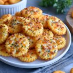 Cheesy garlic Ritz cracker bites baked until crispy and golden.