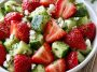 Fresh cucumber strawberry salad with sliced strawberries and cucumbers.