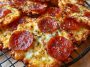 Crispy pepperoni cheese crisps baked until golden, with melted cheese and slightly curled pepperoni slices.