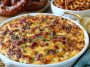 Creamy cheesy pretzel dip served with soft pretzels for dipping.