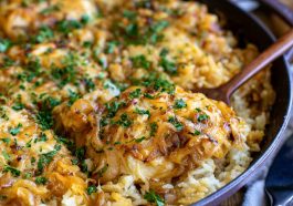 One-pot French onion chicken and rice topped with melted cheese.