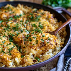 One-pot French onion chicken and rice topped with melted cheese.
