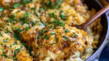 One-pot French onion chicken and rice topped with melted cheese.