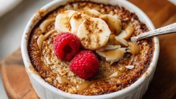 Snickerdoodle baked oats with cinnamon sugar topping, soft and fluffy.
